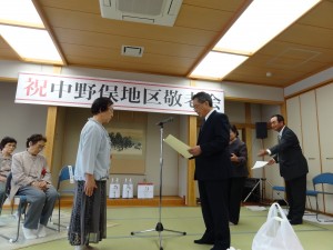 阿部時男東陽コミ振会長が市長の代理で賀詞伝達